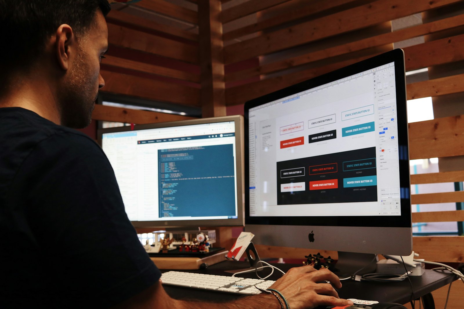 A professional analysing data at a workstation
